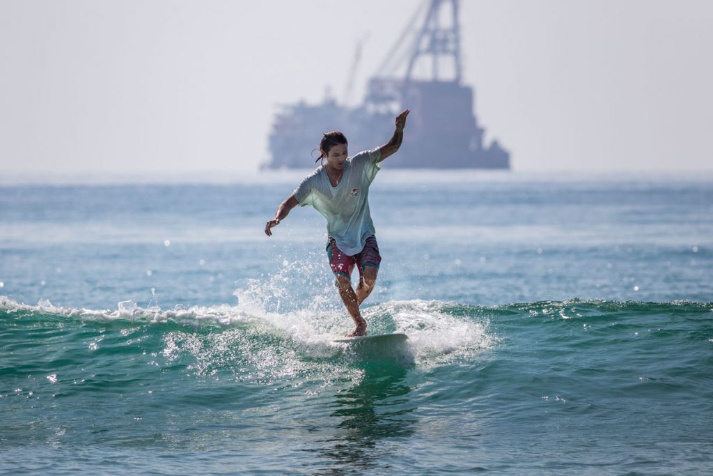 surfing in Hainan ri yue wan sun moon bay