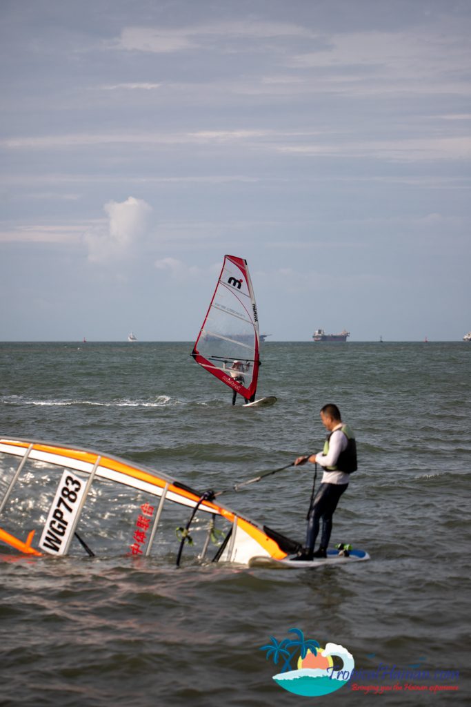 two windsurfers in the ocean
