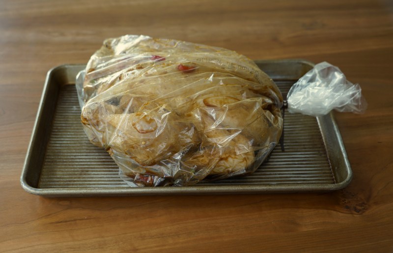 Marinade the chicken in a sealable bag, push out all the air and seal the bag