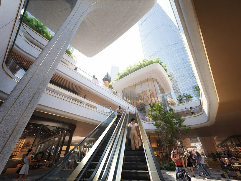 A sunken piazza connects corridors, creating a lively, multi-layered environment
