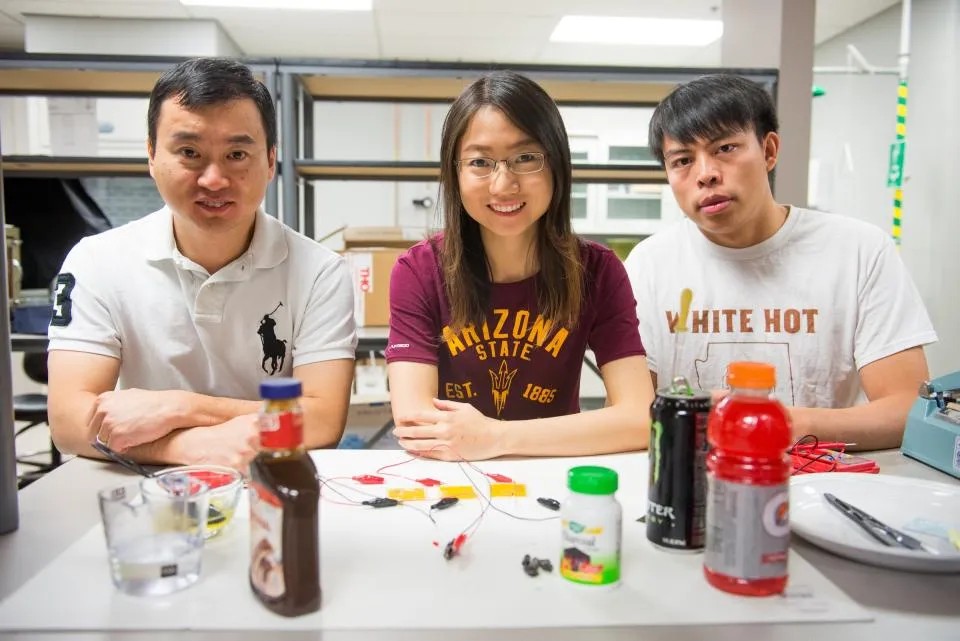 Hanqing Jiang (left) and his students, Wenwen Xu and Xu Wang, with their supercapacitor materials